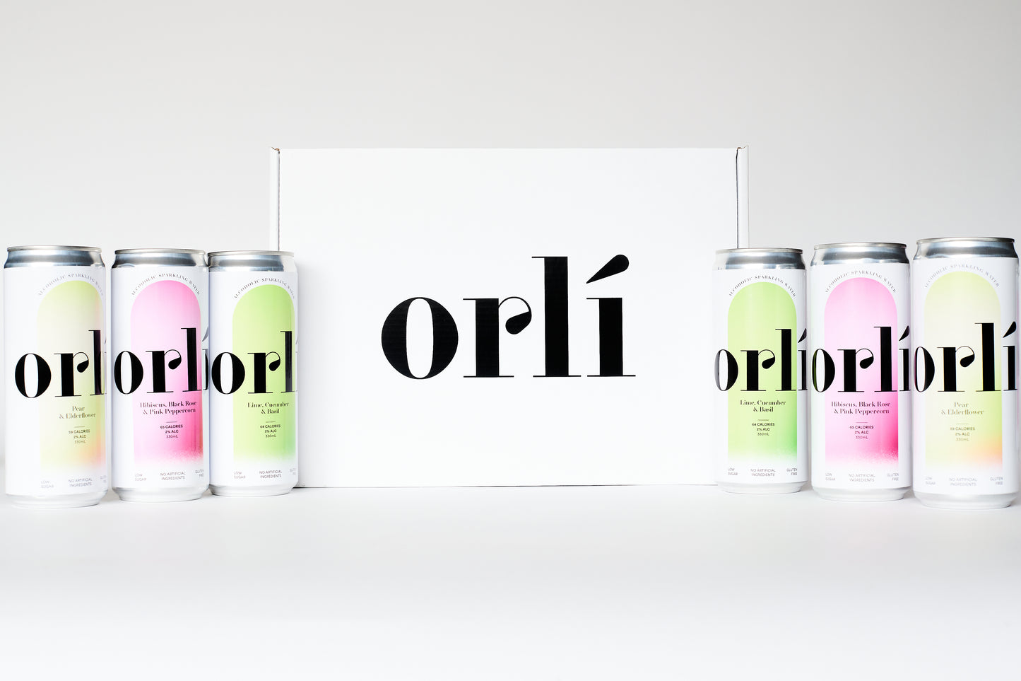 orli box with 2 of each flavour on display, lime cucumber and basil, hibiscus black rose and pink peppercorn and pear and elderflower
